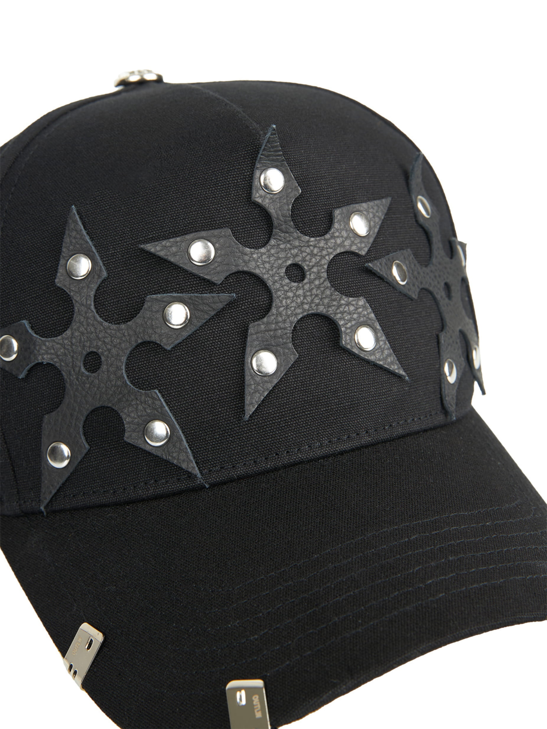 black canvas and mesh trucker hat with leather patches and silver clips