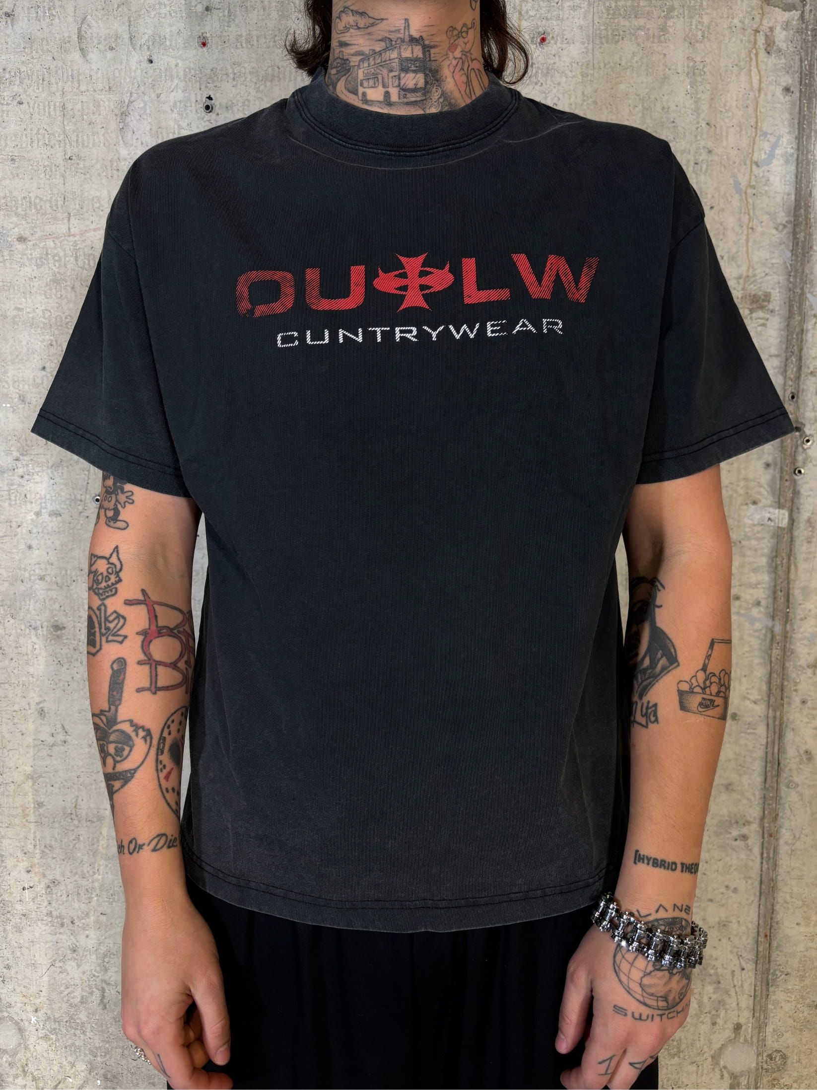 sun faded vintage t shirt with distressed red graphic