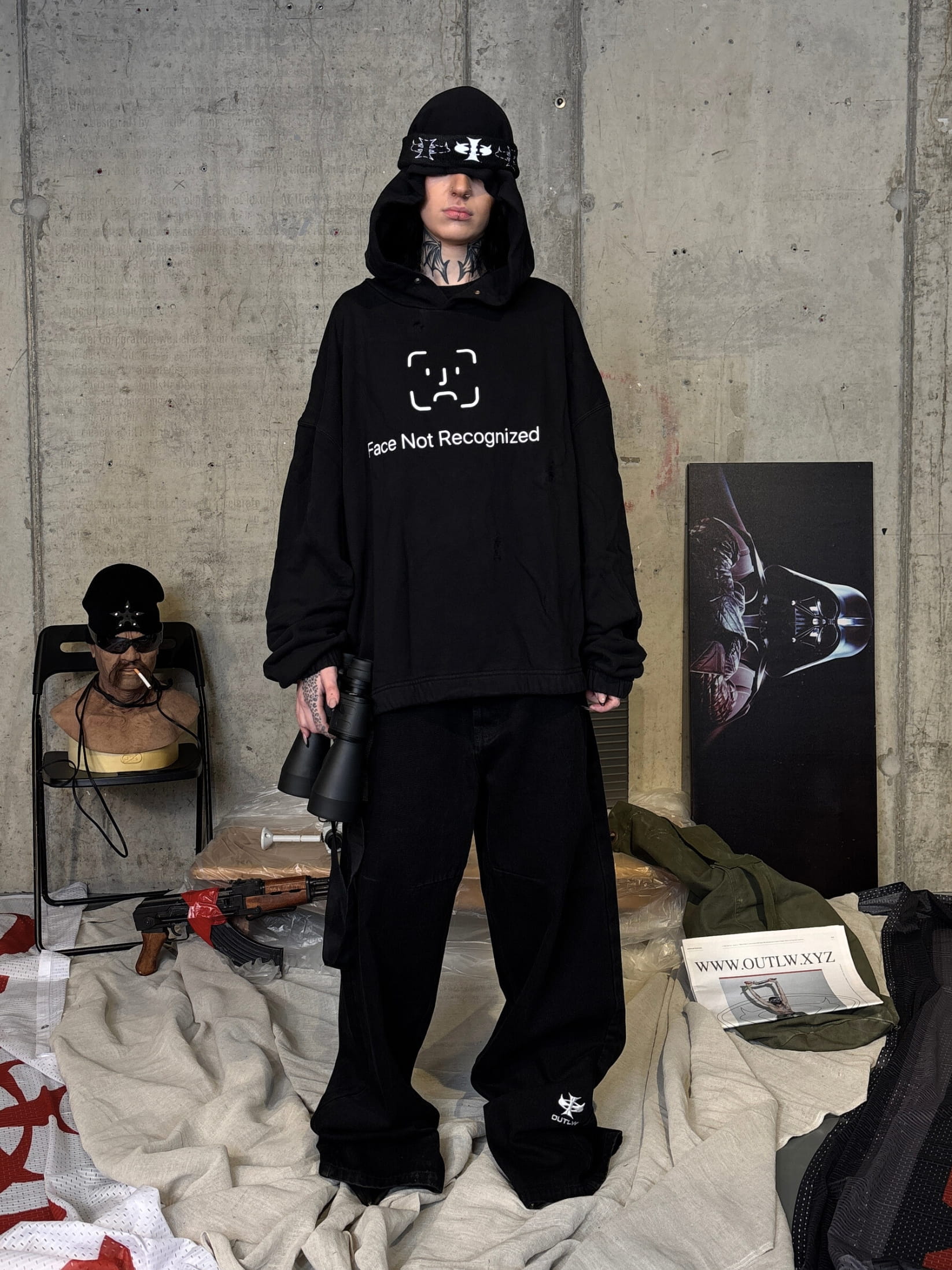 Relaxed fit black streetwear hoodie with "face not recognized" graphic print
