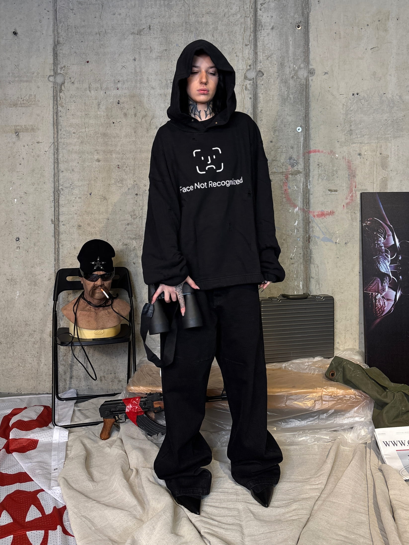 Relaxed fit black streetwear hoodie with "face not recognized" graphic print
