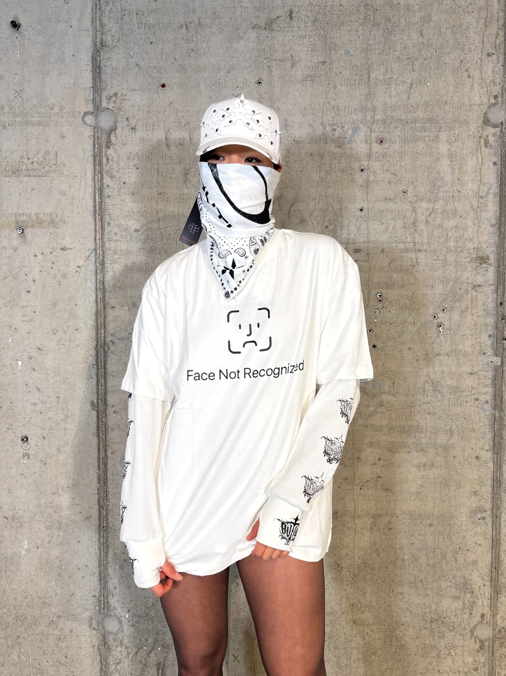Relaxed fit white t shirt with "Face Not Recognized" text and graphic
