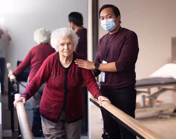 Oxa Care's physiotherapist working with elderly resident