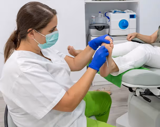 Oxa Care's podiatrist working with elderly resident