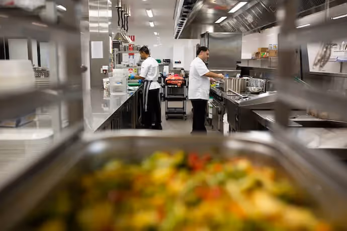 Chefs preparing meals in Oxa Care's kitchen