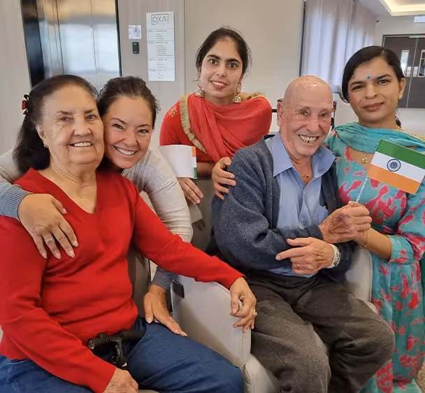 Oxa Care staff with residents showing care
