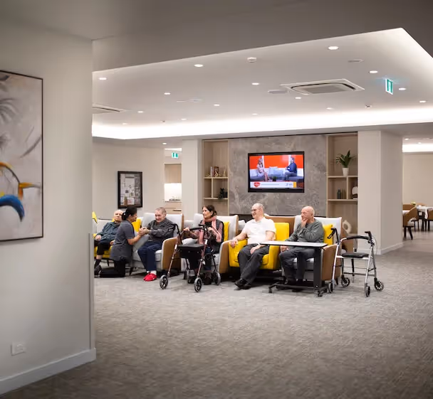 Residents gathered in a communal area