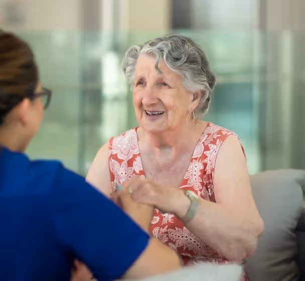 Oxa resident with a member of the care team