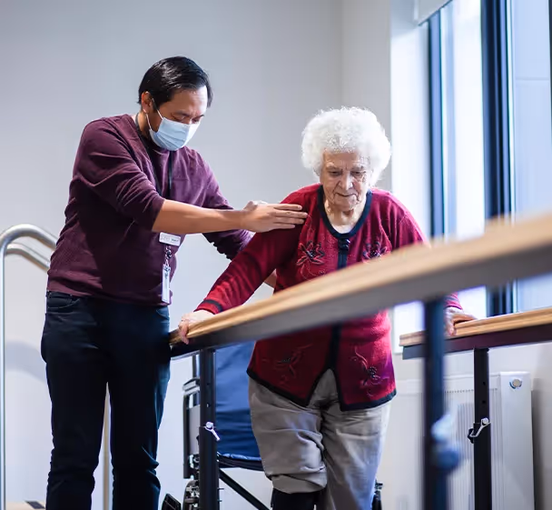 Oxa Care staff providing specialist care to a resident