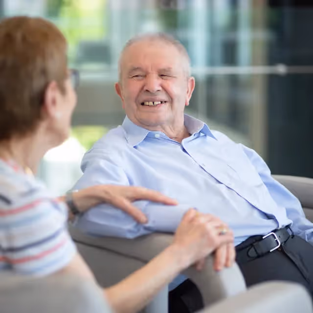 Two Oxa residents chatting
