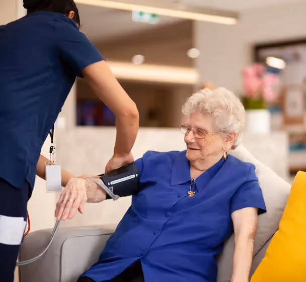 Oxa Care medical equipment being used on a resident by a registered nurse