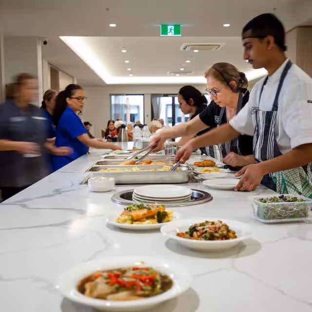 Oxa Care staff preparing meals