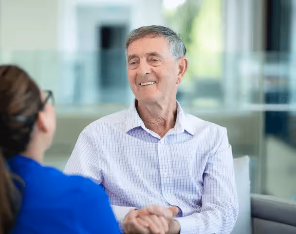Staff member talking to a resident 