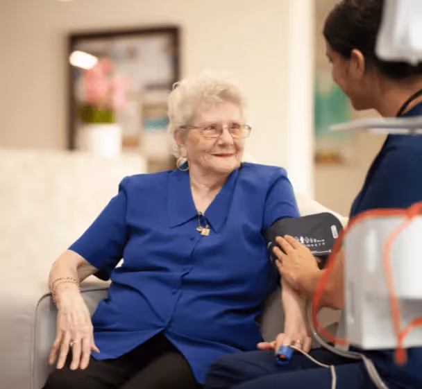 Nurse taking care of resident 