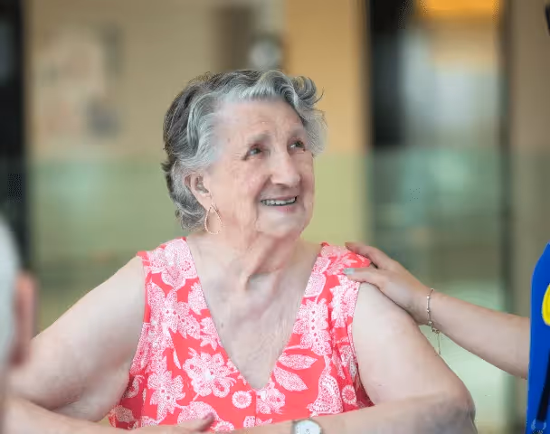 Staff member talking to a resident