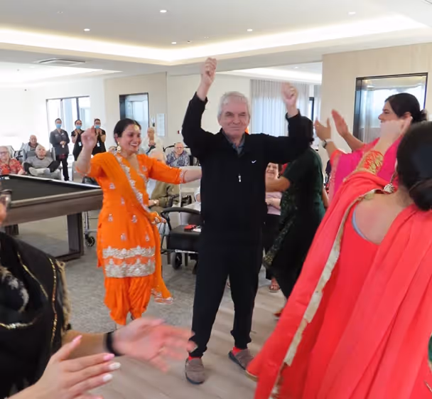 Oxa Care residents near Mernda enjoying cultural dancing and community life.