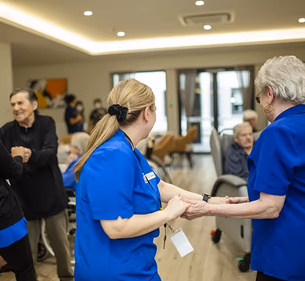 esidents from Thomastown enjoying music and dance activities at Oxa Care nursing home, supported by caring staff.