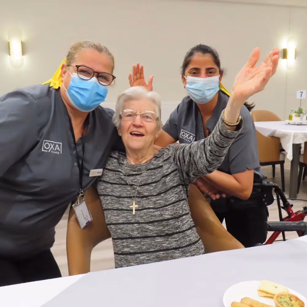 Elderly resident enjoying life at Oxa Care aged care home near Lalor with caring staff