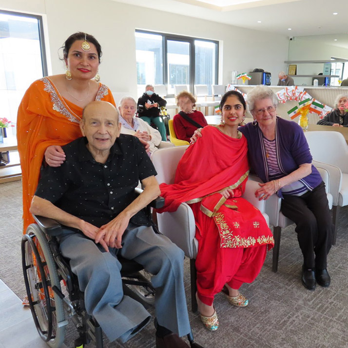 Residents and staff celebrating a cultural event together.