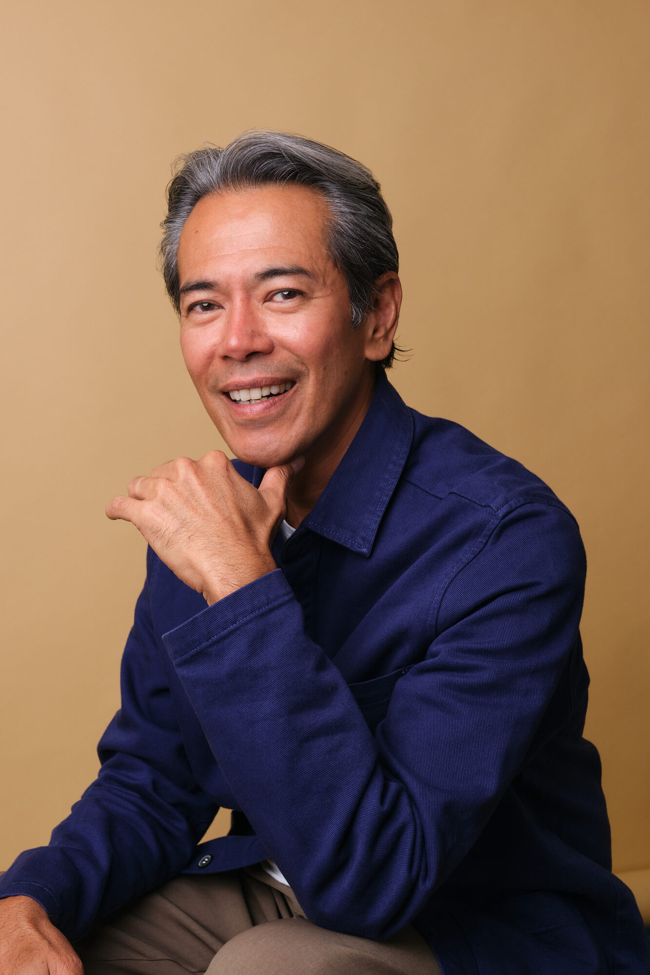 Headshot photo by John Clarke