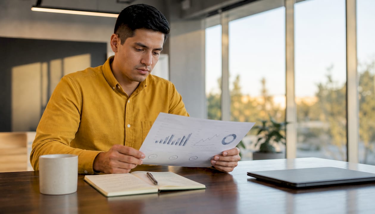 Agent examining training performance report