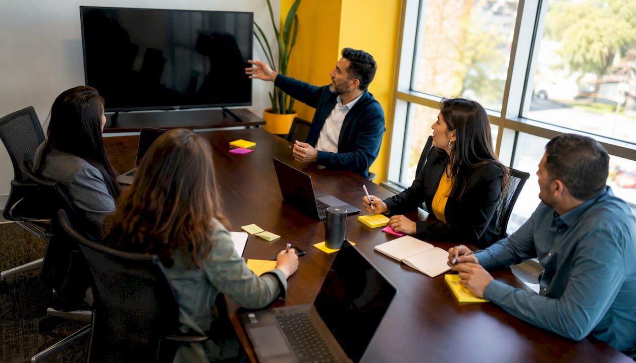 Man leading legal intake governance meeting