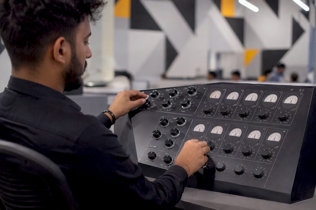 Hands adjusting call center operational controls