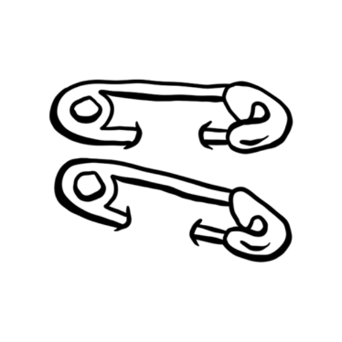 Two safety pins designed by Carli Cherry.