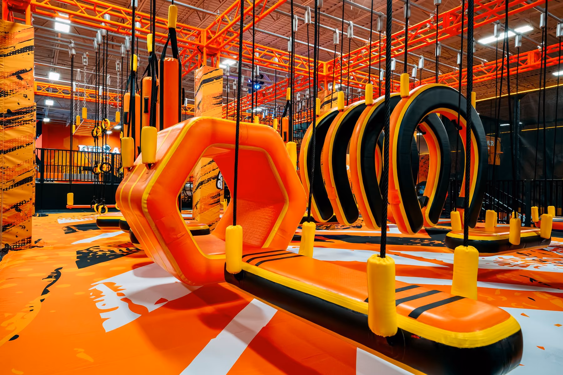 Younger children on the Lil Ninja course at a Big Air indoor trampoline park