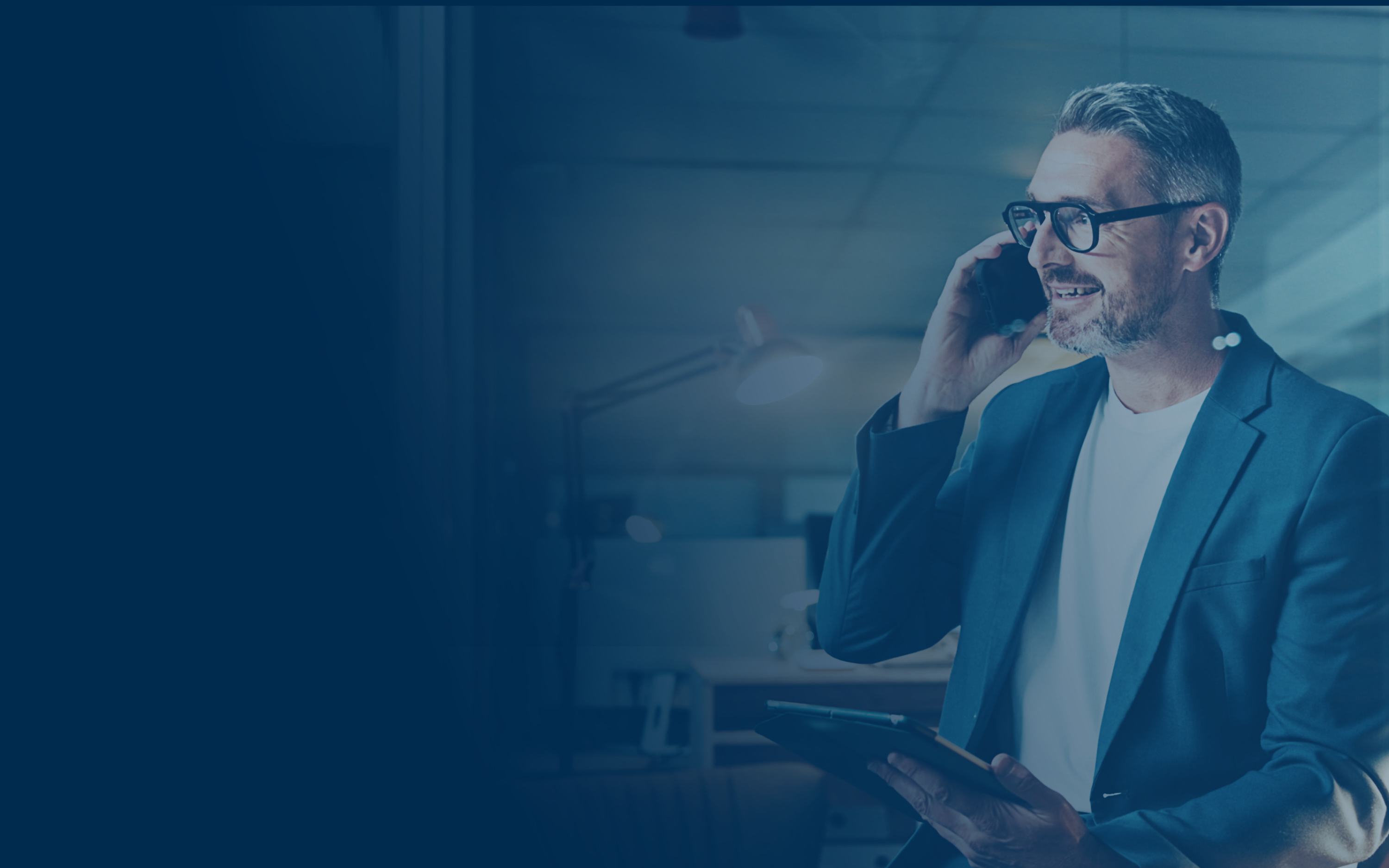 Man on the phone in business suit.