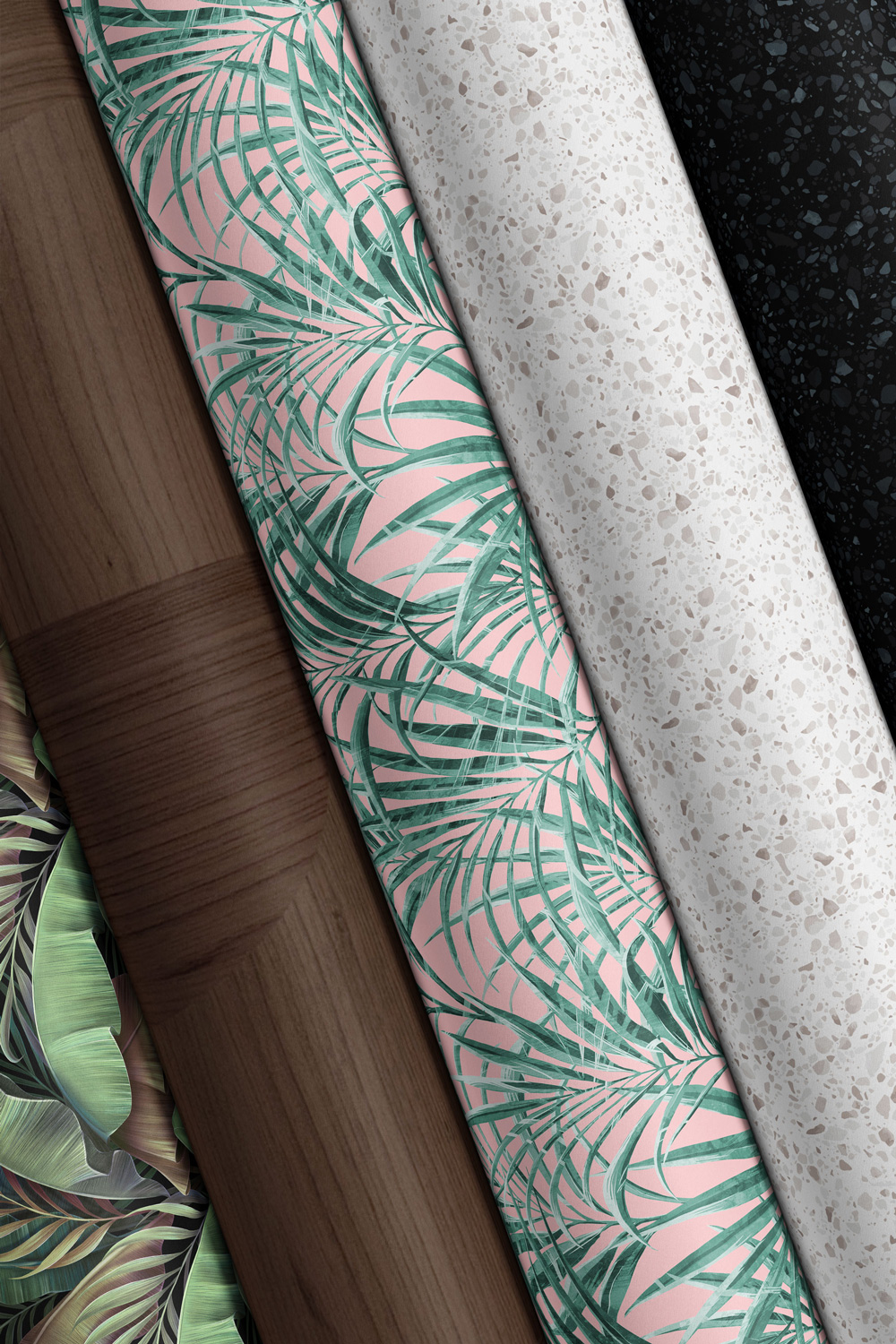 Rolls of wallpaper in multiple different prints grouped together