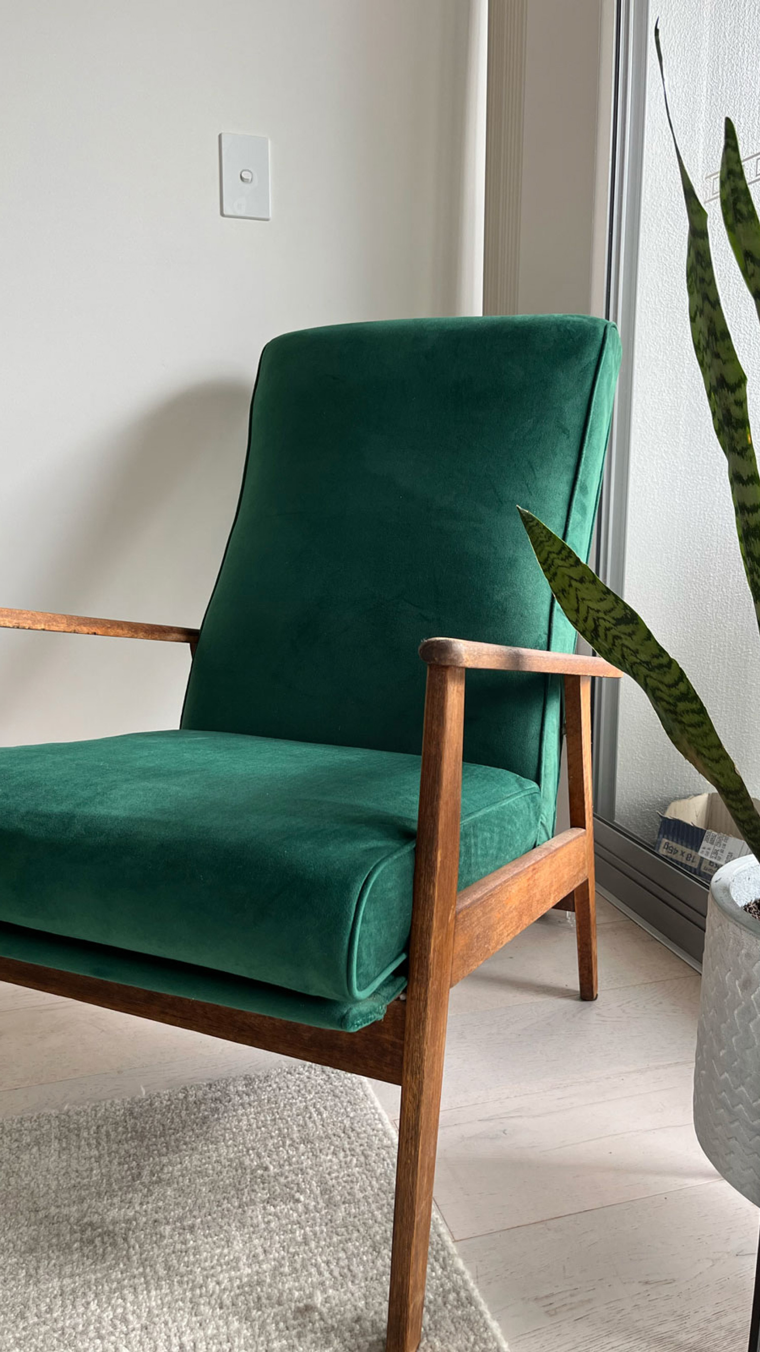 Chair upholstered in a custom green velvet