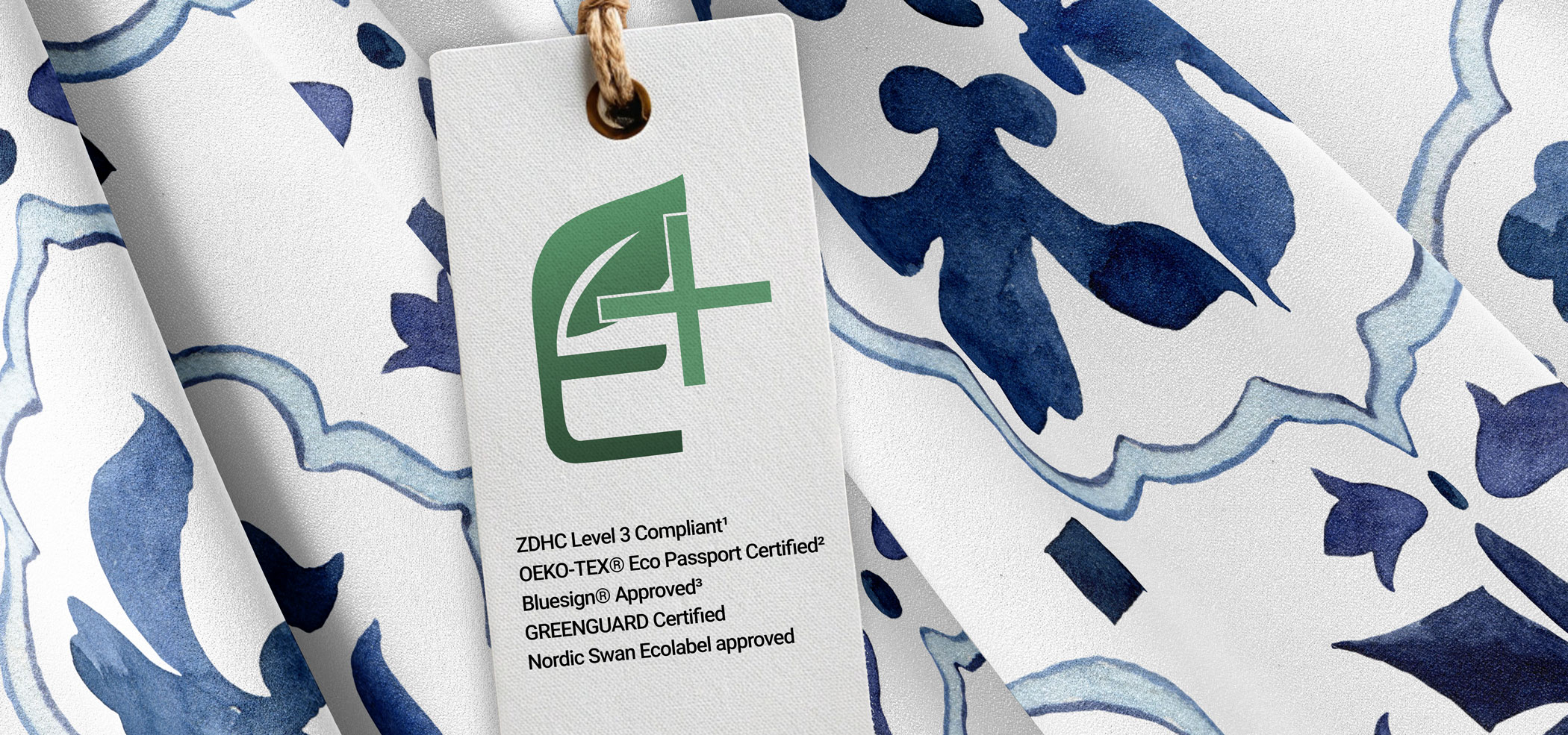 Printed fabric with a swing tag that has the Ecollective logo on it