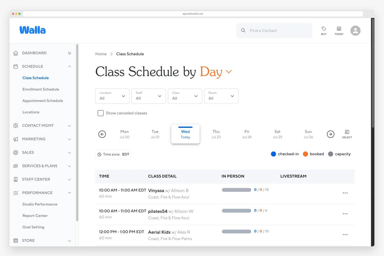 Walla day schedule view showing the full day of classes, teachers, and bookings in a browser window