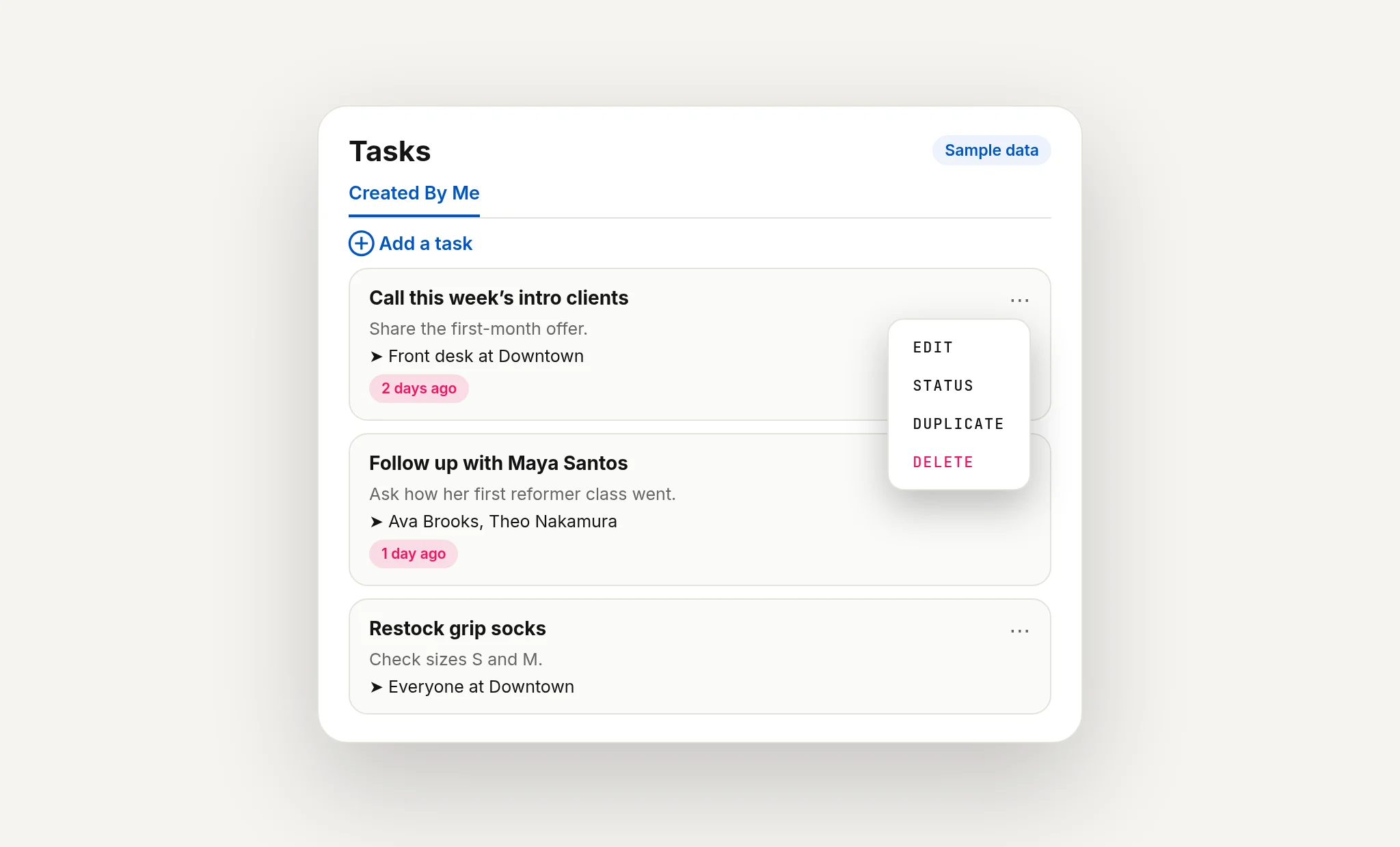 Sample Tasks list with assignees, overdue badges and card actions, fictional staff