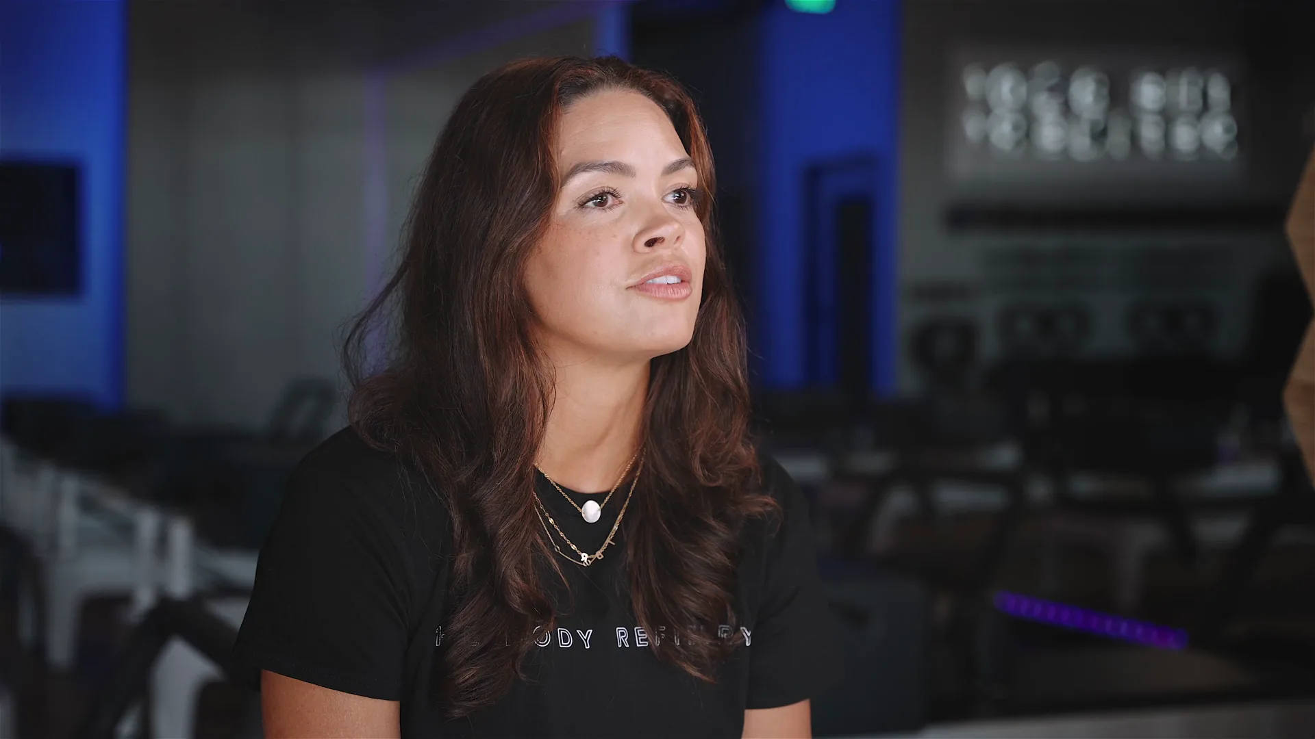 April Grillo, founder of The Body Refinery, speaking in her studio