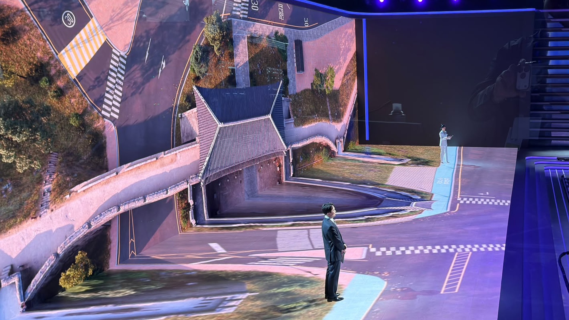 MBC presenters on the LED floor of the Election 2026 studio set in Seoul, driven by Analog Way Aquilon RS4
