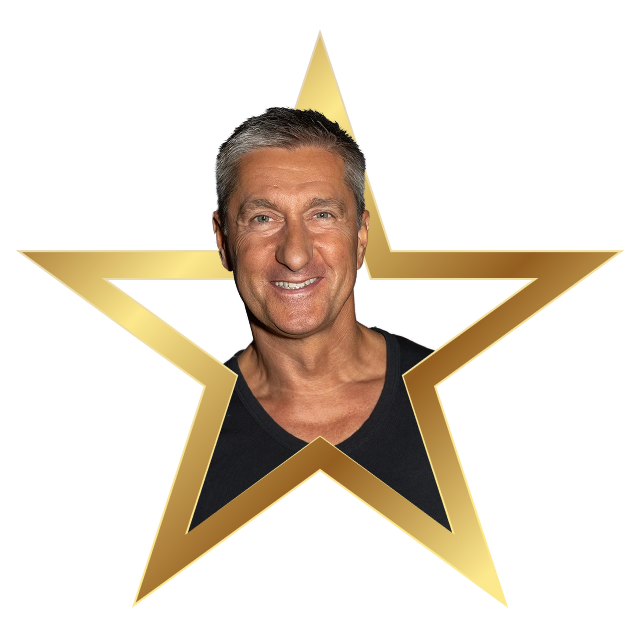 Smiling middle-aged man with short gray hair inside a gold star-shaped frame on a black background.