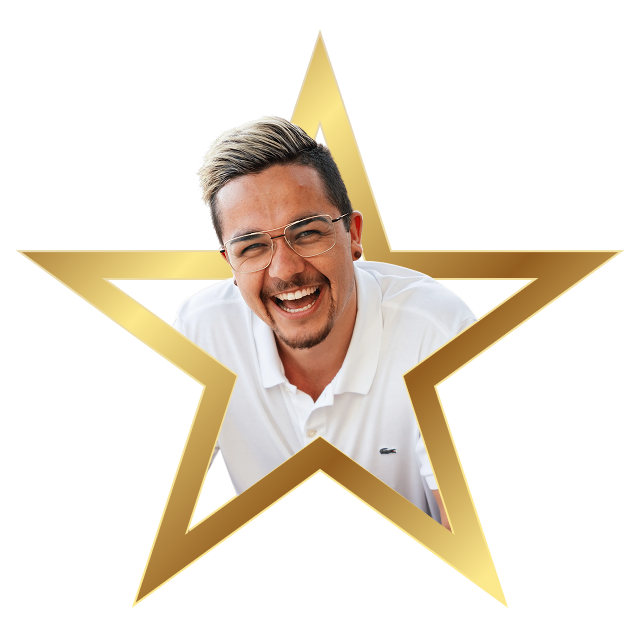 Smiling man with glasses and short hair wearing a white polo shirt inside a gold star frame.