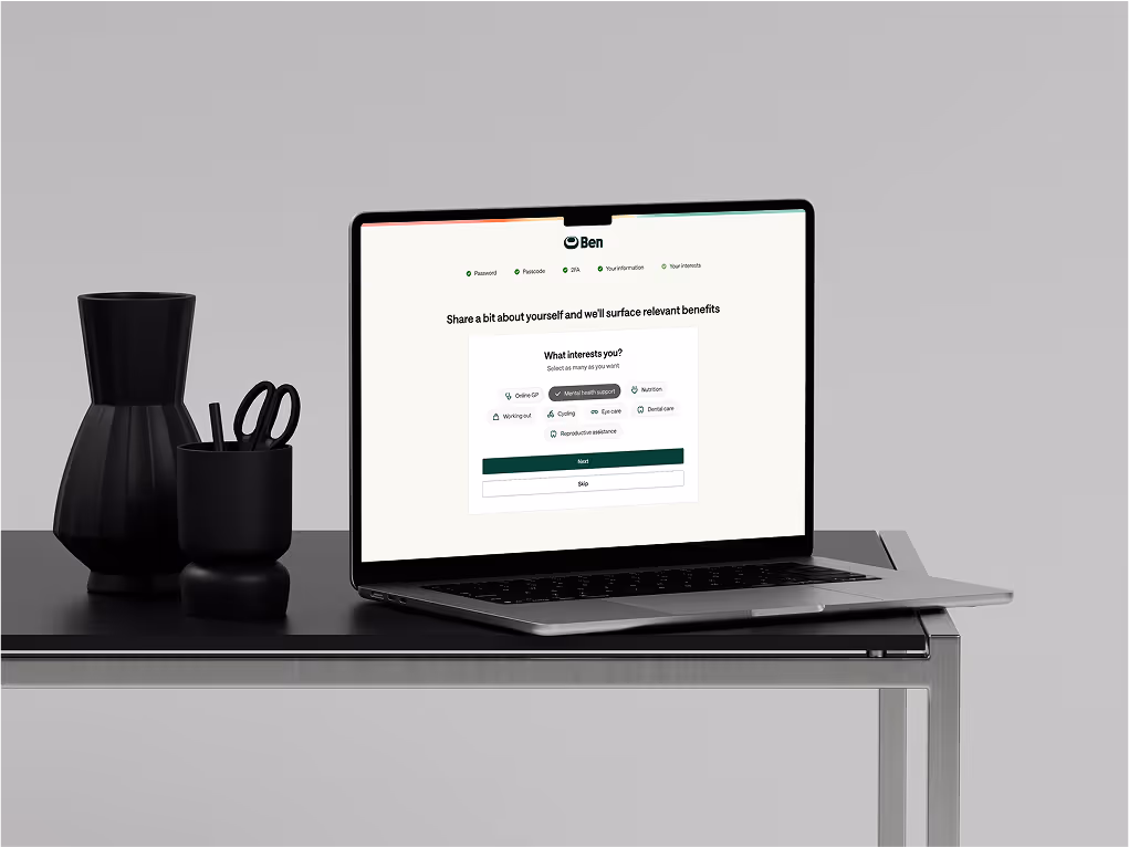 A photo of a laptop showing Ben's onboarding flow, capturing what employees care about