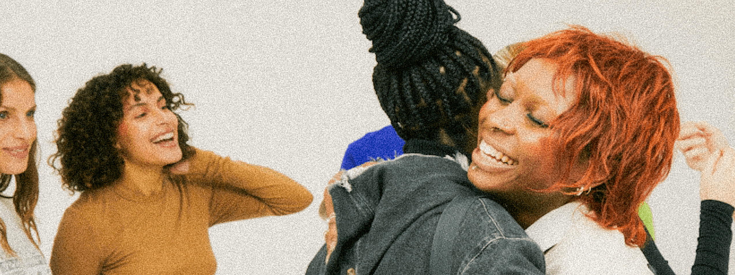 A photo of a person leaning their head on another person's shoulder, with a pop out image of an AI-powered benefits platform 