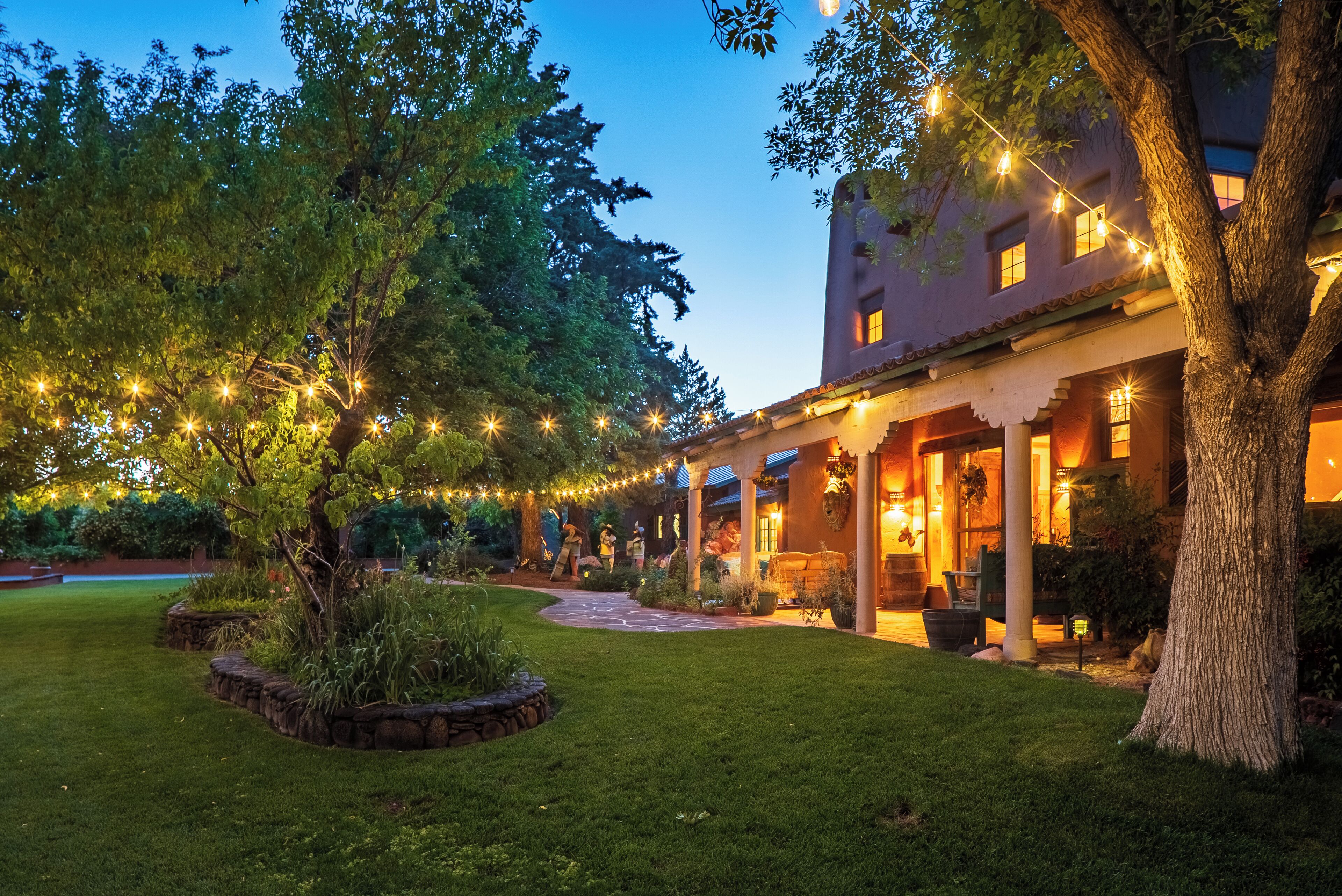 VRBO wedding venue at night with string lights
