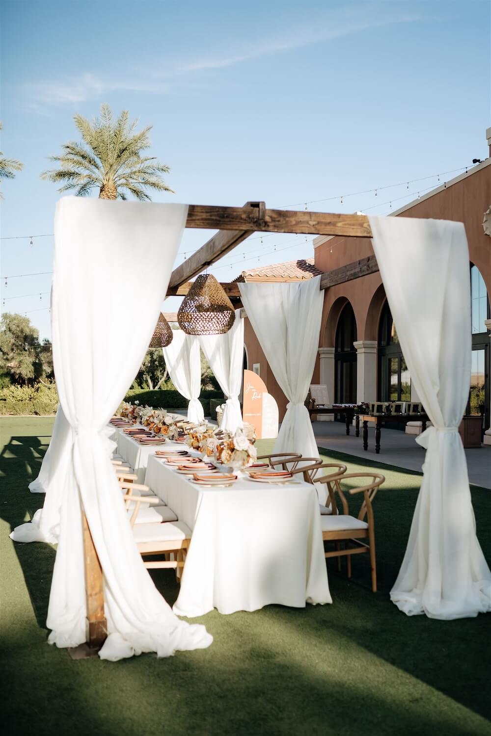 Reception set up with palm trees at a Las Vegas micro wedding venue