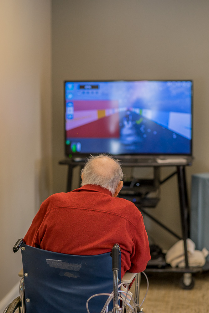 A senior man uses the Jintronix technology at The Ohio Eastern Star rehabilitation facilities.