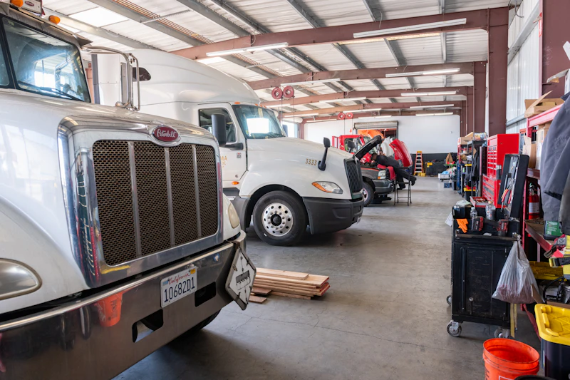 repair bay with multiple trucks in a row