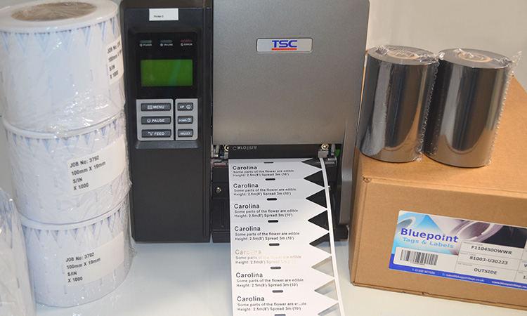 A thermal transfer plant label printer printing stick in horticulture labels or plant pot labels or dibbers