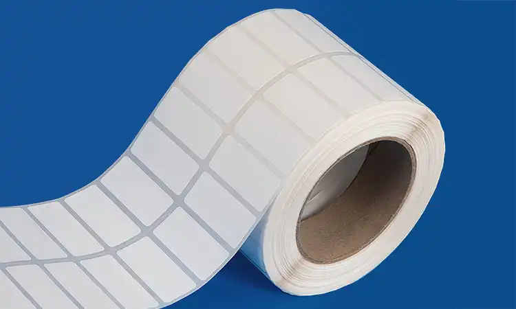 A roll of self-adhesive labels designed for thermal transfer printing