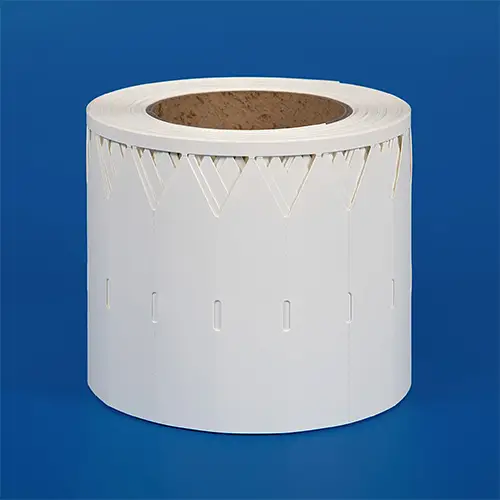 Thermal transfer printable stick in labels on a roll