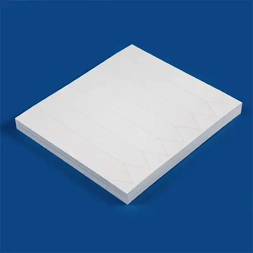 Laser printable sheeted stick in labels