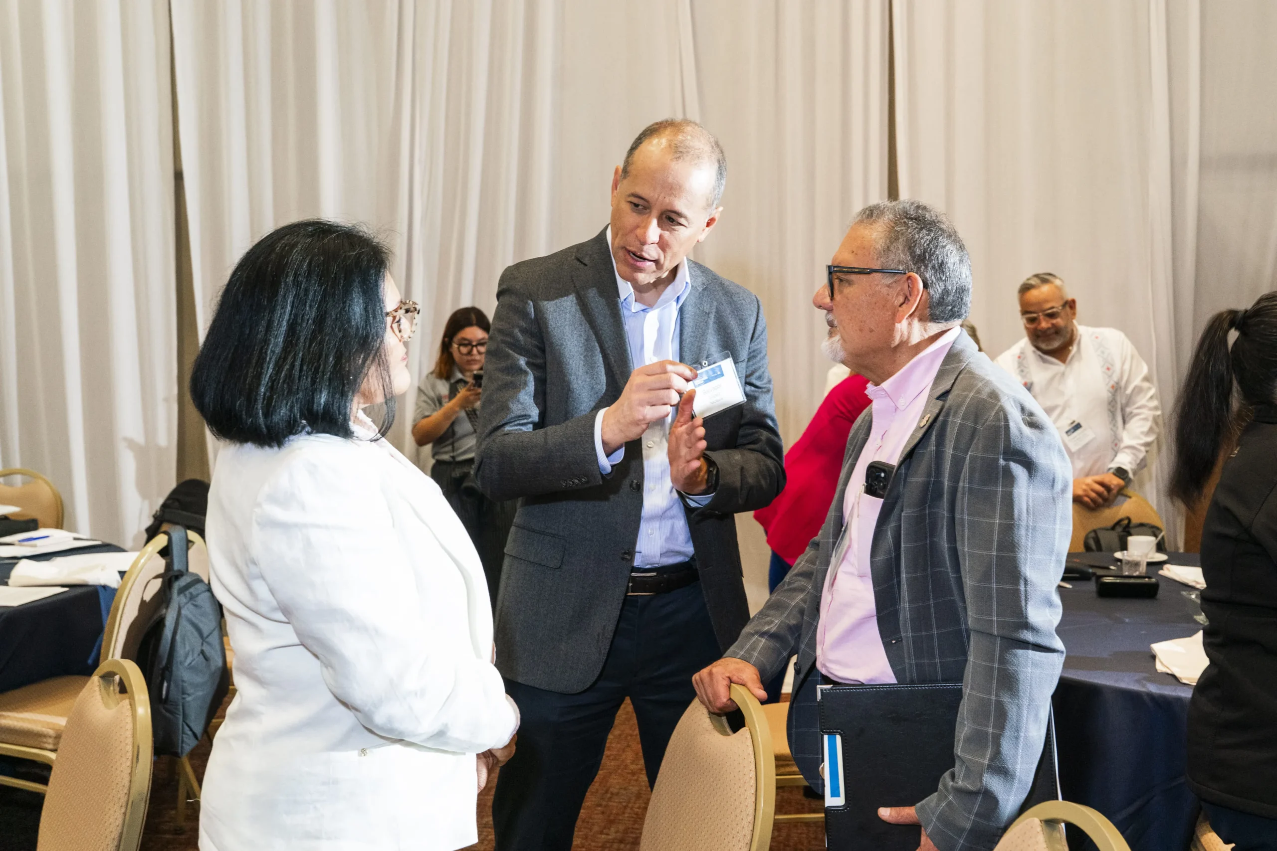 Participants in discussion at an Institute of the Americas binational forum.