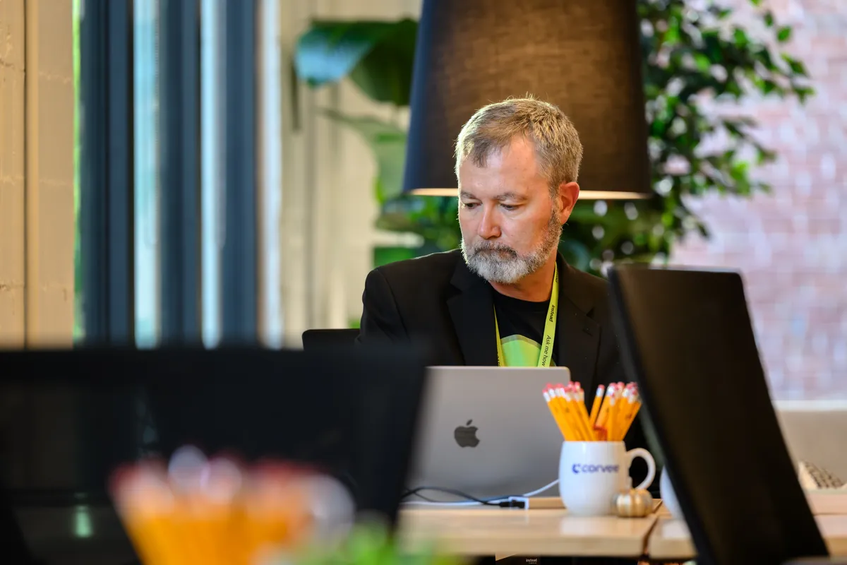 Team member working at their desk